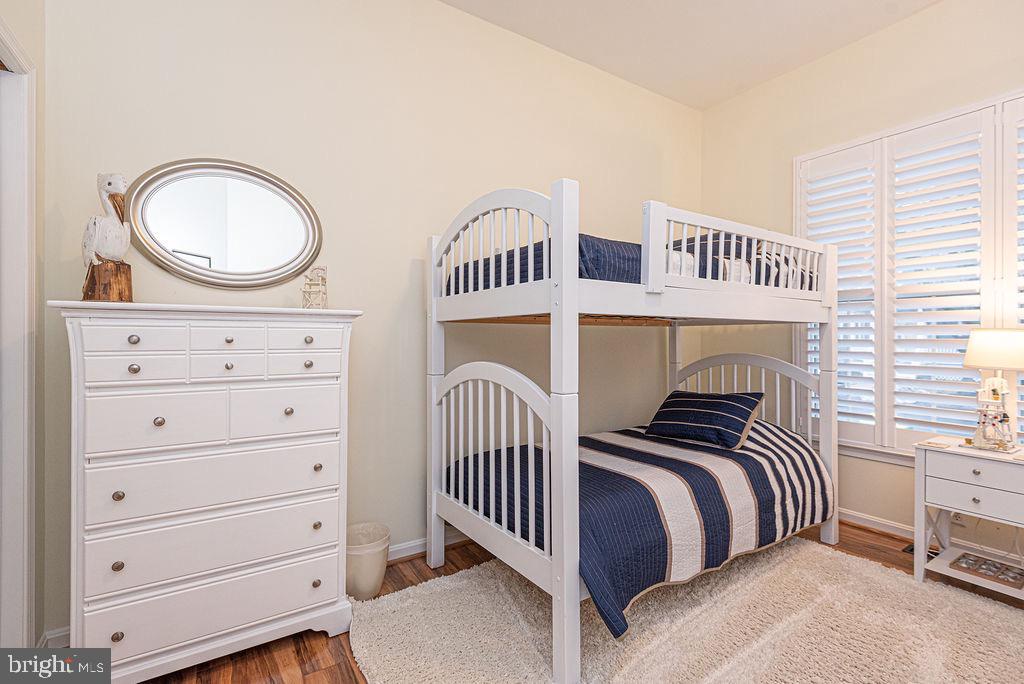 89 October Glory Avenue Ocean View, DE 19970 - Photo 57 of 77 a bedroom with two beds and a dresser