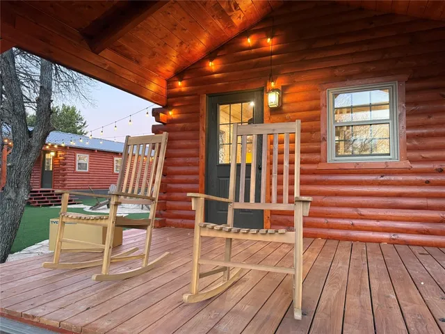 a balcony view with a seating space