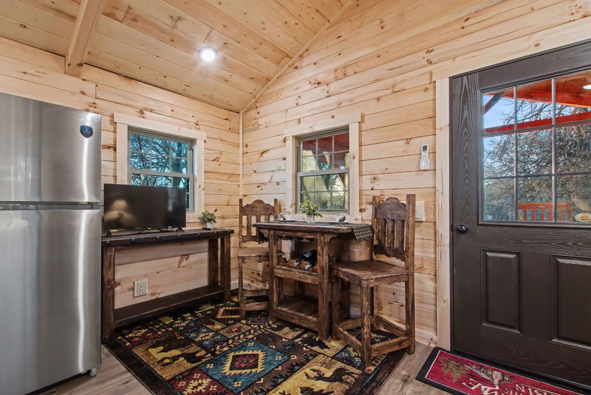 13510 County Road 3642 Kempner, TX 76539 - Photo 13 of 38 a kitchen with stainless steel appliances granite countertop a stove and a refrigerator