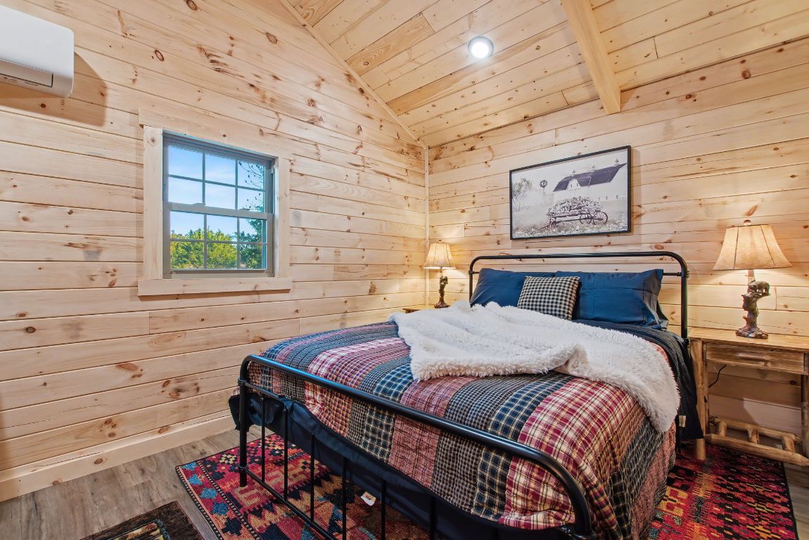 13510 County Road 3642 Kempner, TX 76539 - Photo 29 of 38 a bedroom with a bed and wooden floor