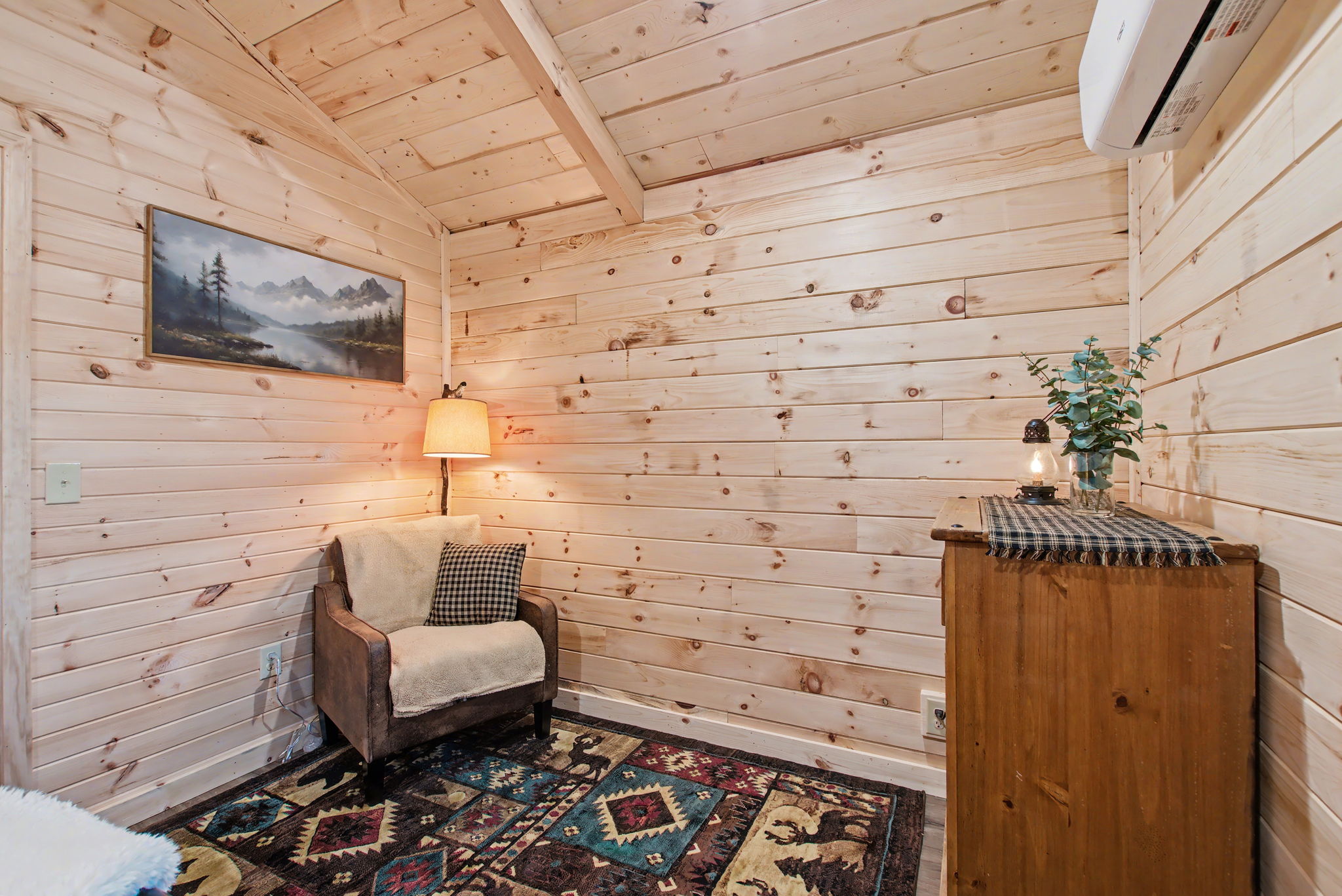 13510 County Road 3642 Kempner, TX 76539 - Photo 30 of 38 Living area featuring wooden walls, wood ceiling, a wall mounted air conditioner, and vaulted ceiling