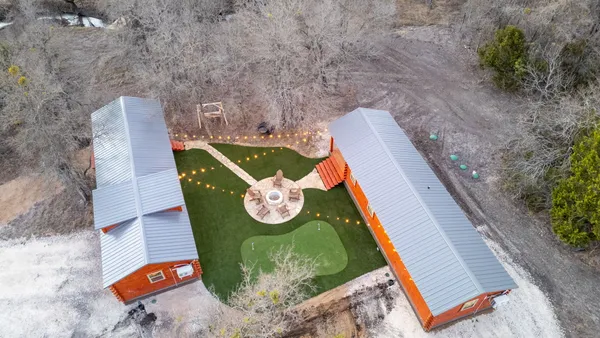 a backyard of a house with lots of green space