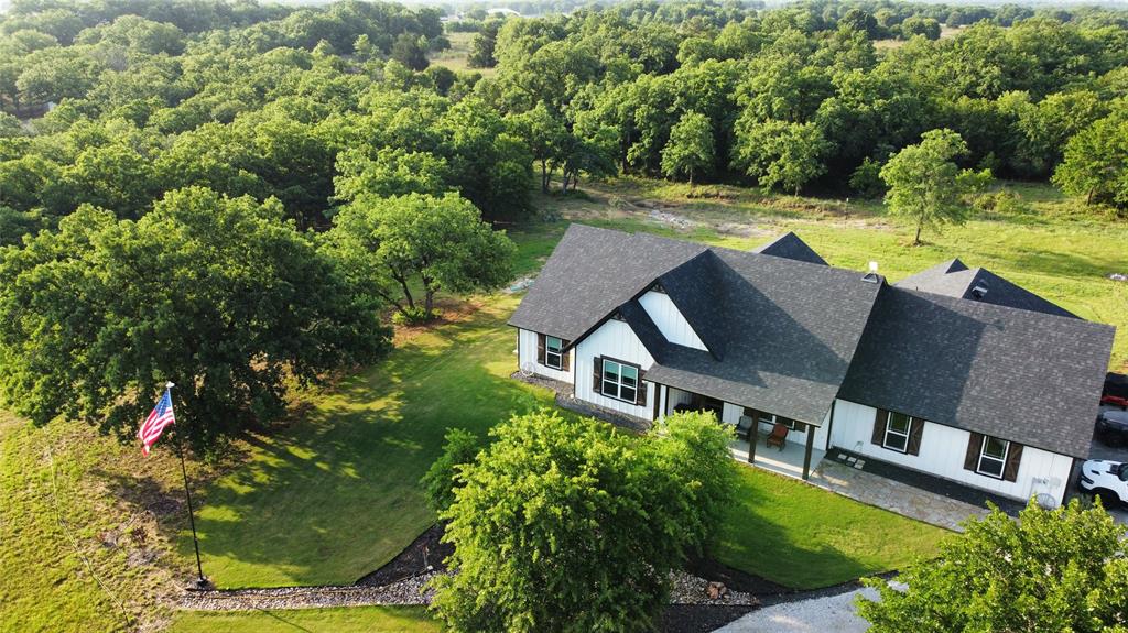 165 Rolling Bnd Road Alvord, TX 76225 - Photo 1 of 35 4.28 Wooded Acres Backing up to the LBJ