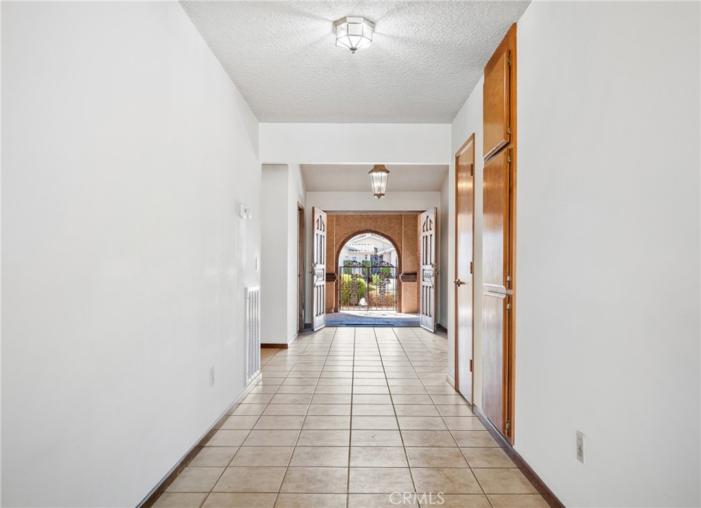 14484 Lighthouse Lane Helendale, CA 92342 - Photo 14 of 58 Looking towards from of home with double front doors open
