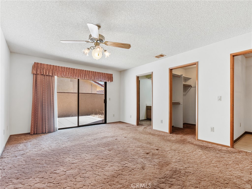 14484 Lighthouse Lane Helendale, CA 92342 - Photo 15 of 58 Primary Bedroom with slider to private side patio