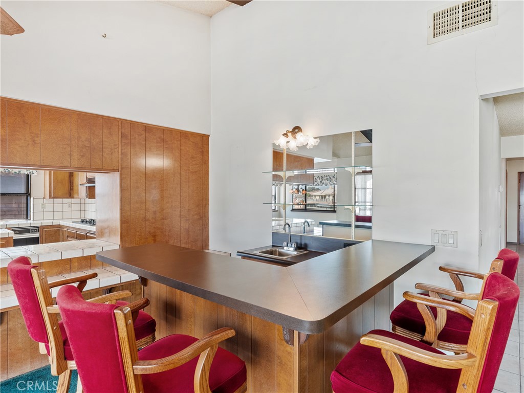 14484 Lighthouse Lane Helendale, CA 92342 - Photo 24 of 58 Wet bar with bar stools included