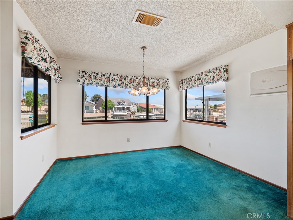 14484 Lighthouse Lane Helendale, CA 92342 - Photo 25 of 58 Dining room with evaporative cooler included