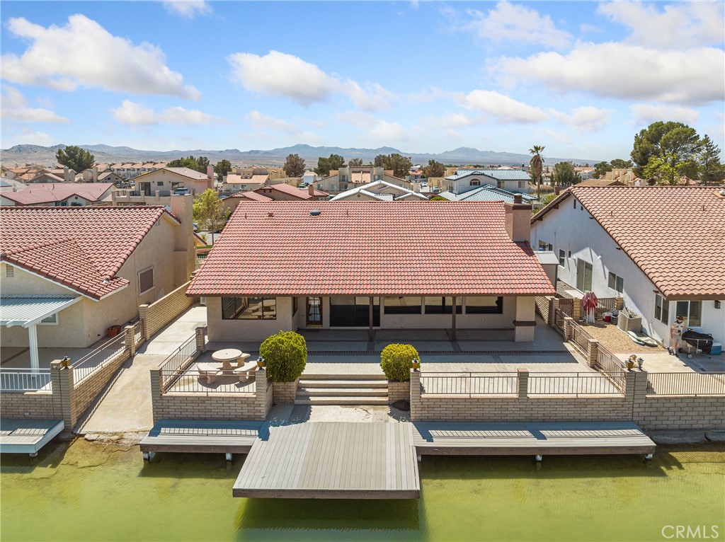 14484 Lighthouse Lane Helendale, CA 92342 - Photo 32 of 58 Back of home with dock and boat ramp
