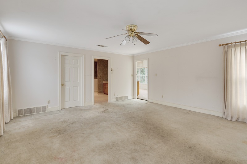 122 North Mendenhall Road Memphis, TN 38117 - Photo 10 of 24 Master leads to large walk-in closet, master bathroom, and large sunroom with wet bar.