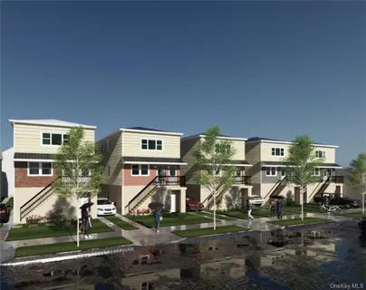 a front view of residential houses with cars parked