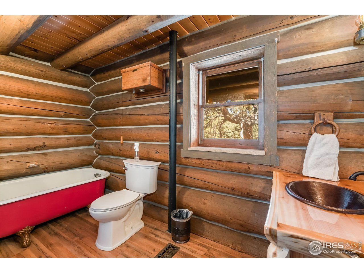 212 Valley Road Lyons, CO 80540 - Photo 16 of 38 a bathroom with a toilet and a shower