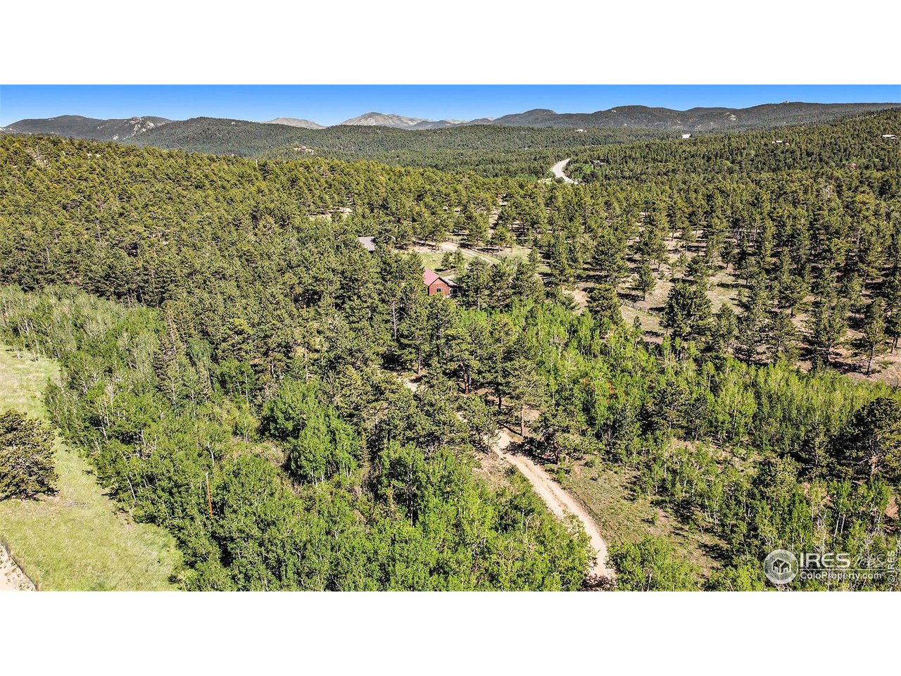 212 Valley Road Lyons, CO 80540 - Photo 2 of 38 a open area with green field