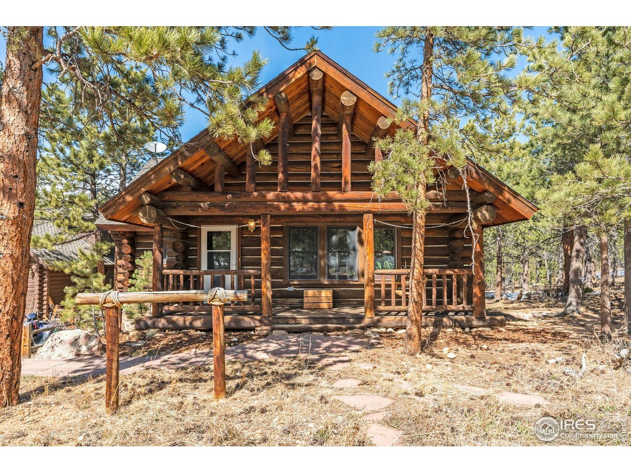 212 Valley Road Lyons, CO 80540 - Photo 28 of 38 front view of a house with a porch