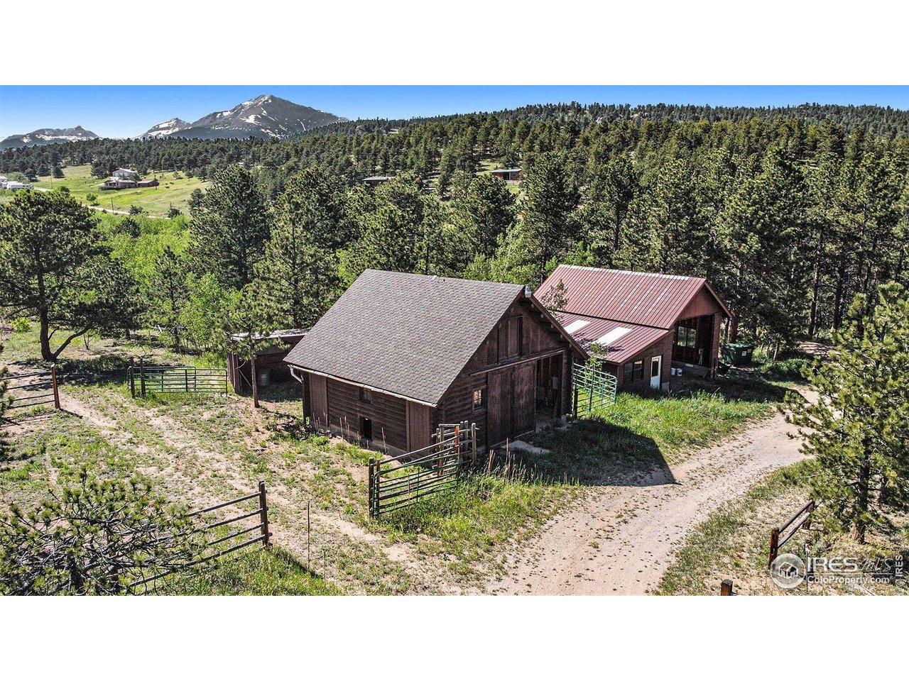 212 Valley Road Lyons, CO 80540 - Photo 31 of 38 a view of a terrace with a table and chairs