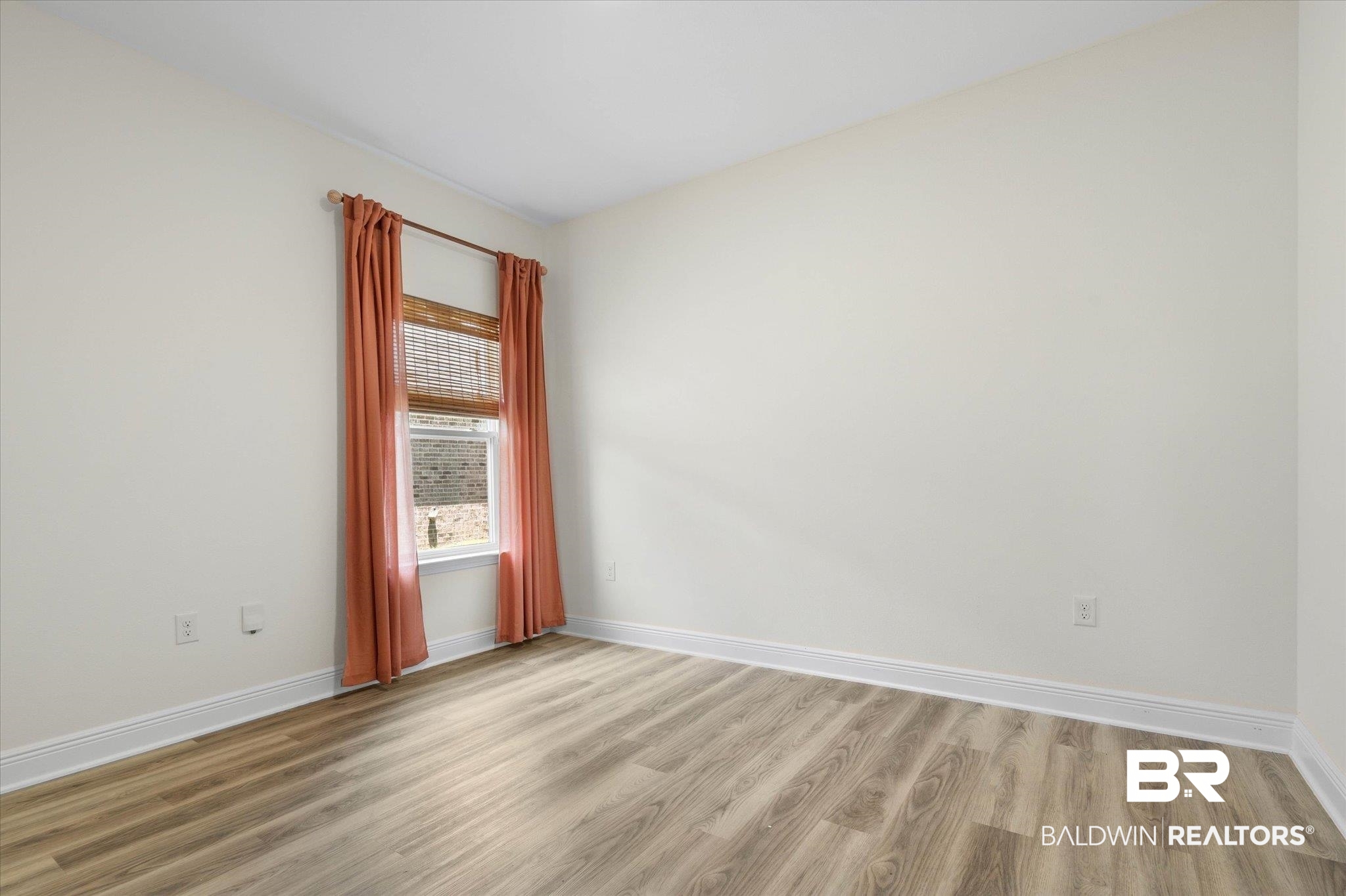 11229 Genuine Risk Circle Daphne, AL 36526 - Photo 21 of 46 Fourth bedroom with baseboards and light wood-style flooring