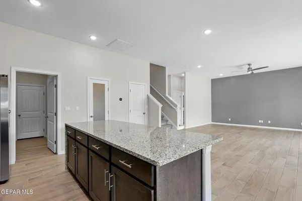 a kitchen with a stove and a sink