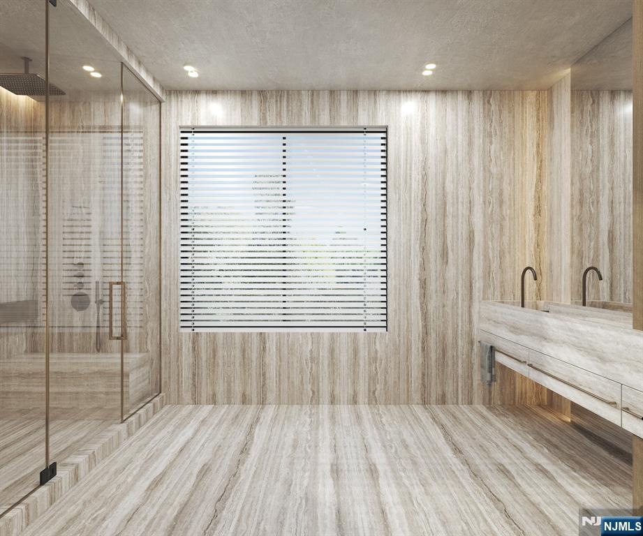 23 Tamarack Road Alpine, NJ 07620 - Photo 30 of 37 a view of a bathroom with a tub and shower