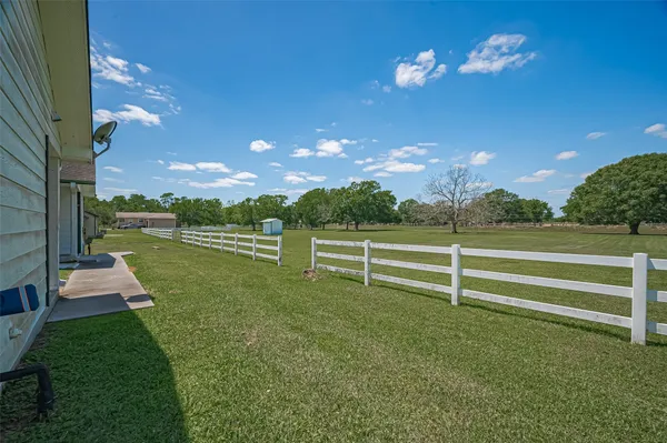 a view of a golf course with a lake
