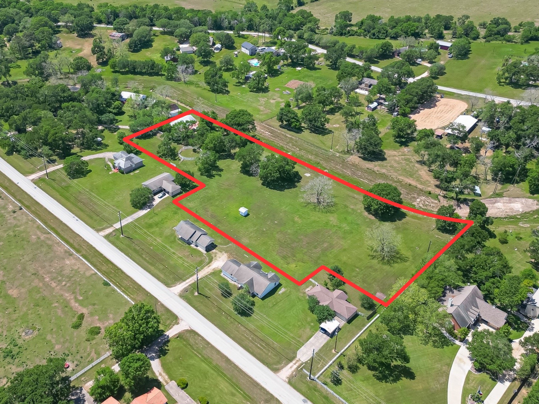 3240-3310 Band Rosenberg, TX 77471 - Photo 7 of 7 an aerial view of a golf course with street