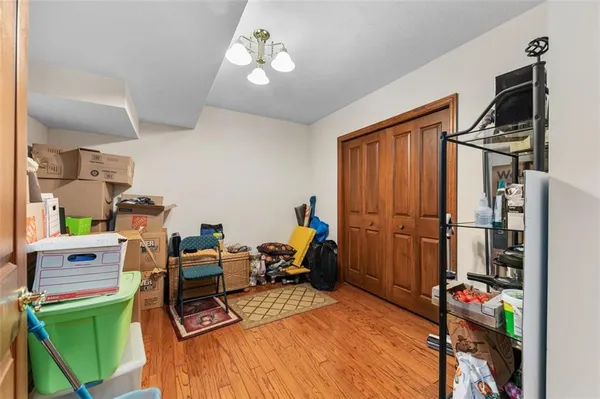a bedroom with furniture and a window