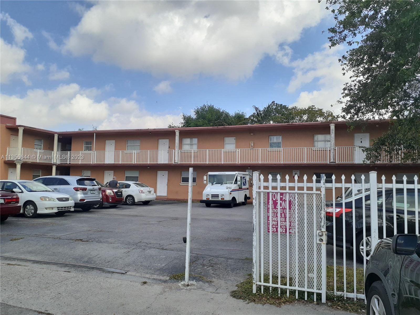 1245 West 24th Street, Unit 118 Hialeah, FL 33010 - Photo 19 of 20 a view of street with parked cars