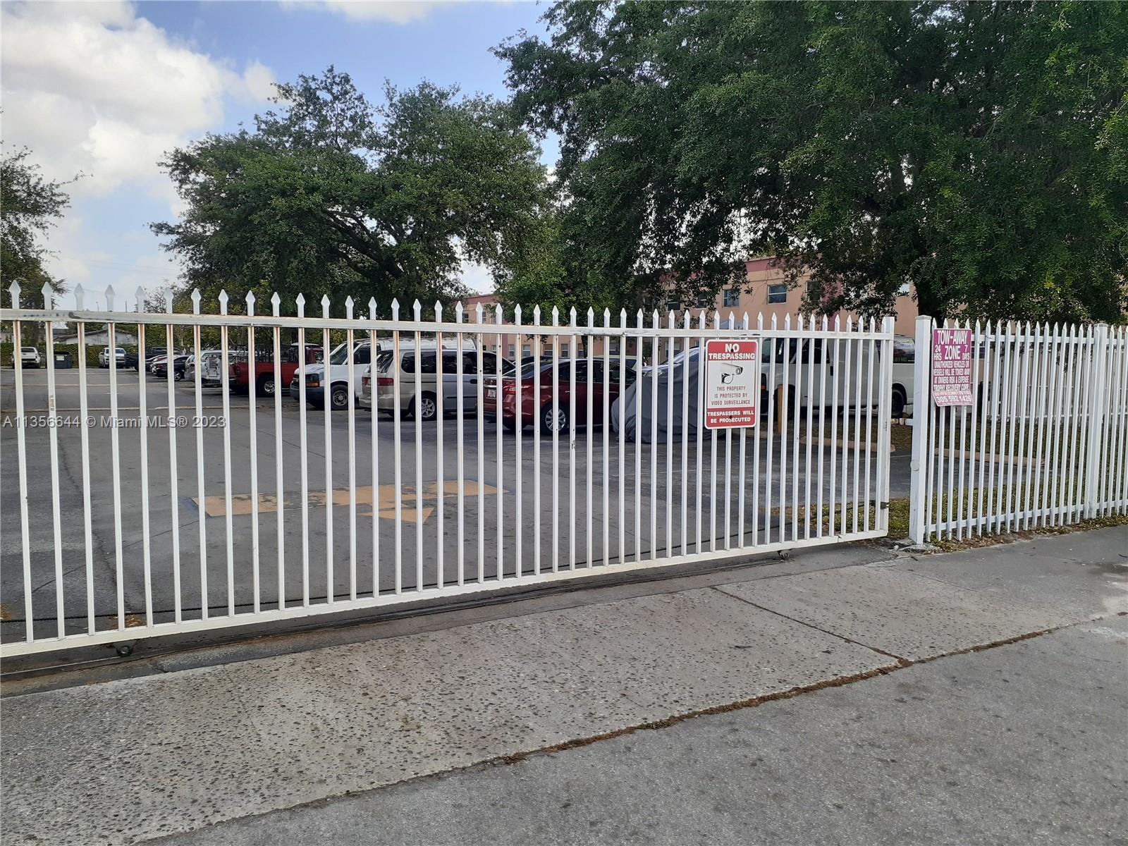 1245 West 24th Street, Unit 118 Hialeah, FL 33010 - Photo 20 of 20 a view of a black gate