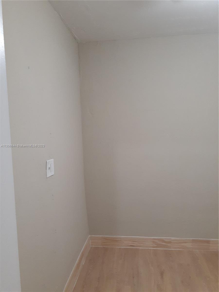 1245 West 24th Street, Unit 118 Hialeah, FL 33010 - Photo 3 of 20 a view of an empty room