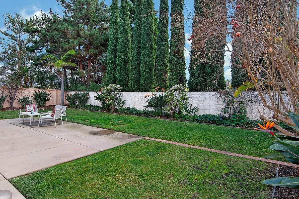 4951 Riding Ridge Road San Diego, CA 92130 - Photo 31 of 32 a view of a chair and table in the garden