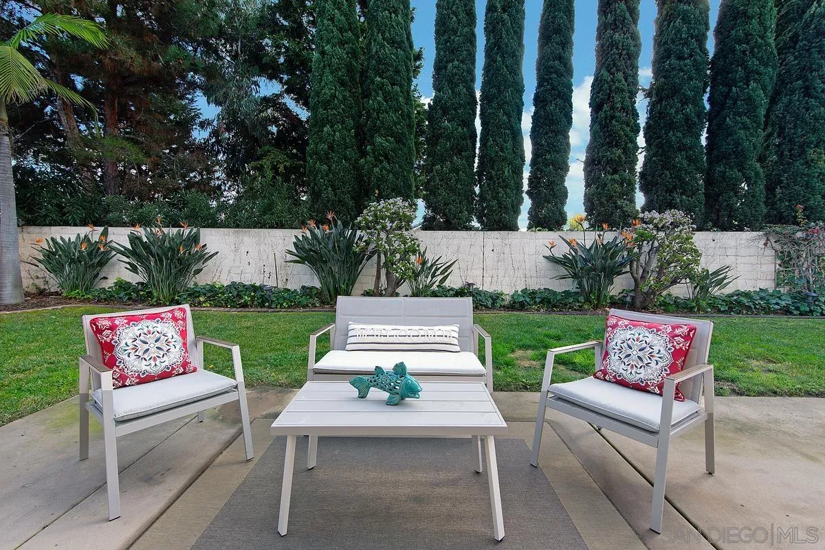 4951 Riding Ridge Road San Diego, CA 92130 - Photo 32 of 32 a view of a table and chairs in the garden