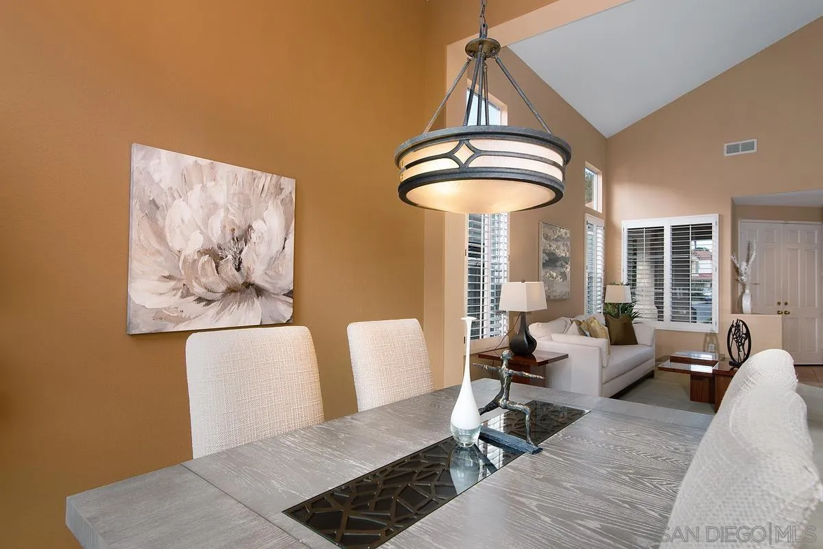 4951 Riding Ridge Road San Diego, CA 92130 - Photo 7 of 32 a living room with furniture and a large window