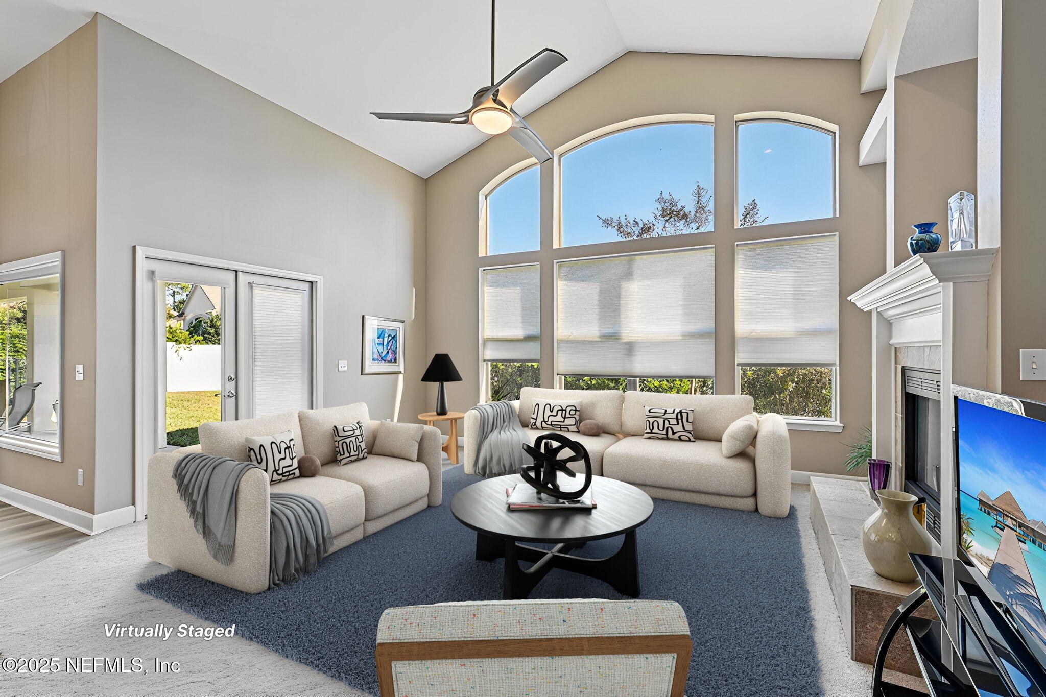 5300 Rising Sun Court St. Johns, FL 32259 - Photo 14 of 43 a living room with furniture a fireplace and a large window