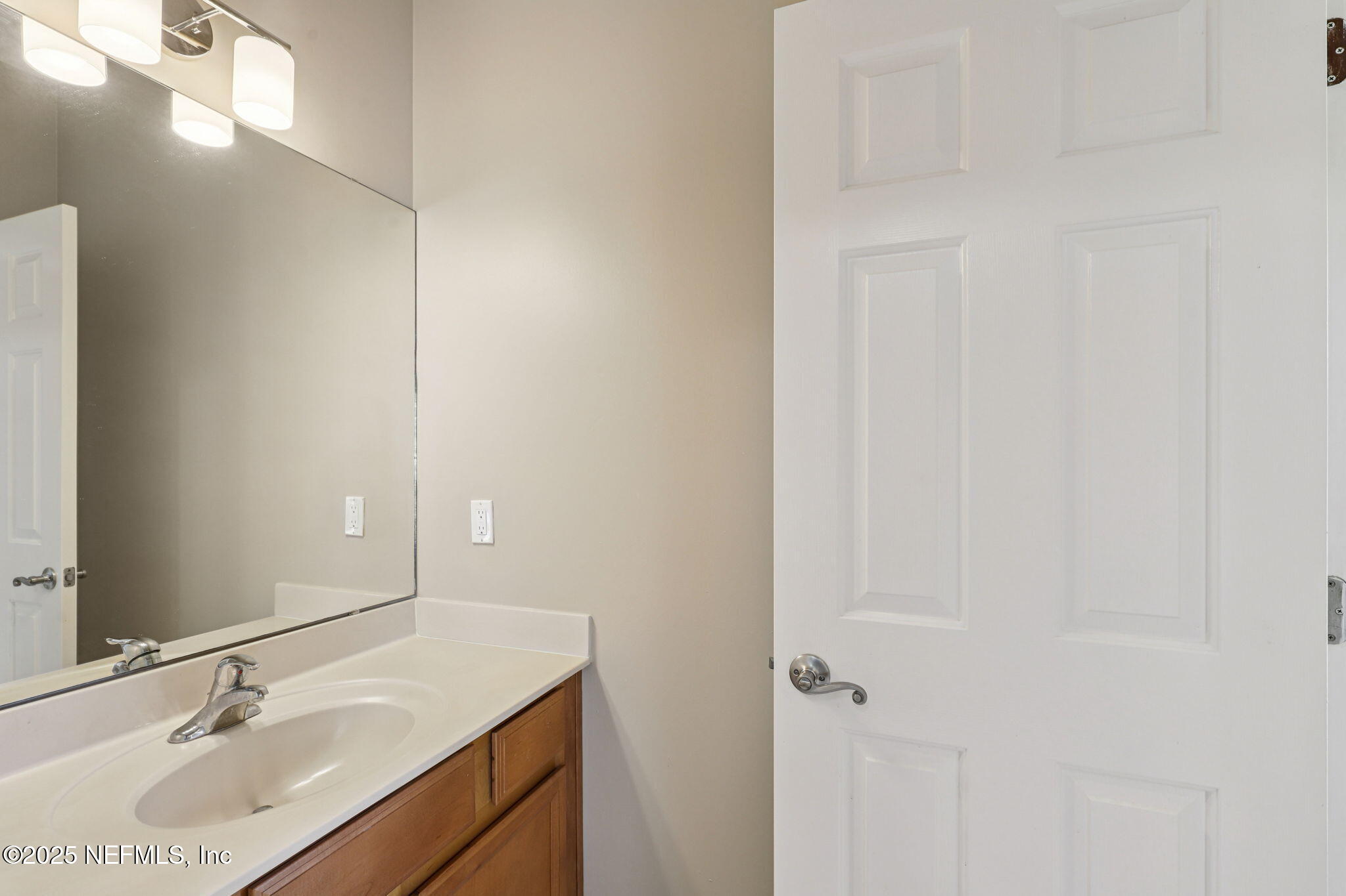 5300 Rising Sun Court St. Johns, FL 32259 - Photo 21 of 43 a bathroom with a sink vanity and a mirror