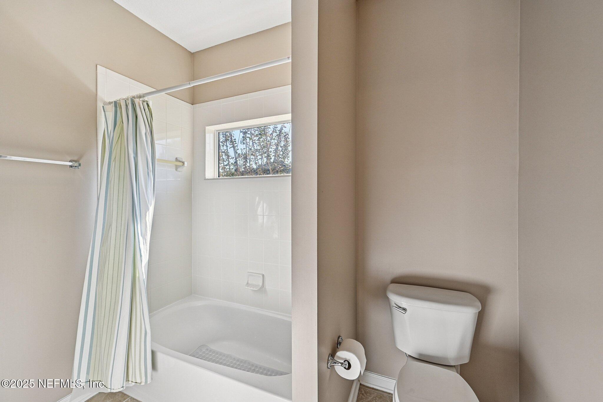 5300 Rising Sun Court St. Johns, FL 32259 - Photo 22 of 43 a bathroom with a toilet and a shower