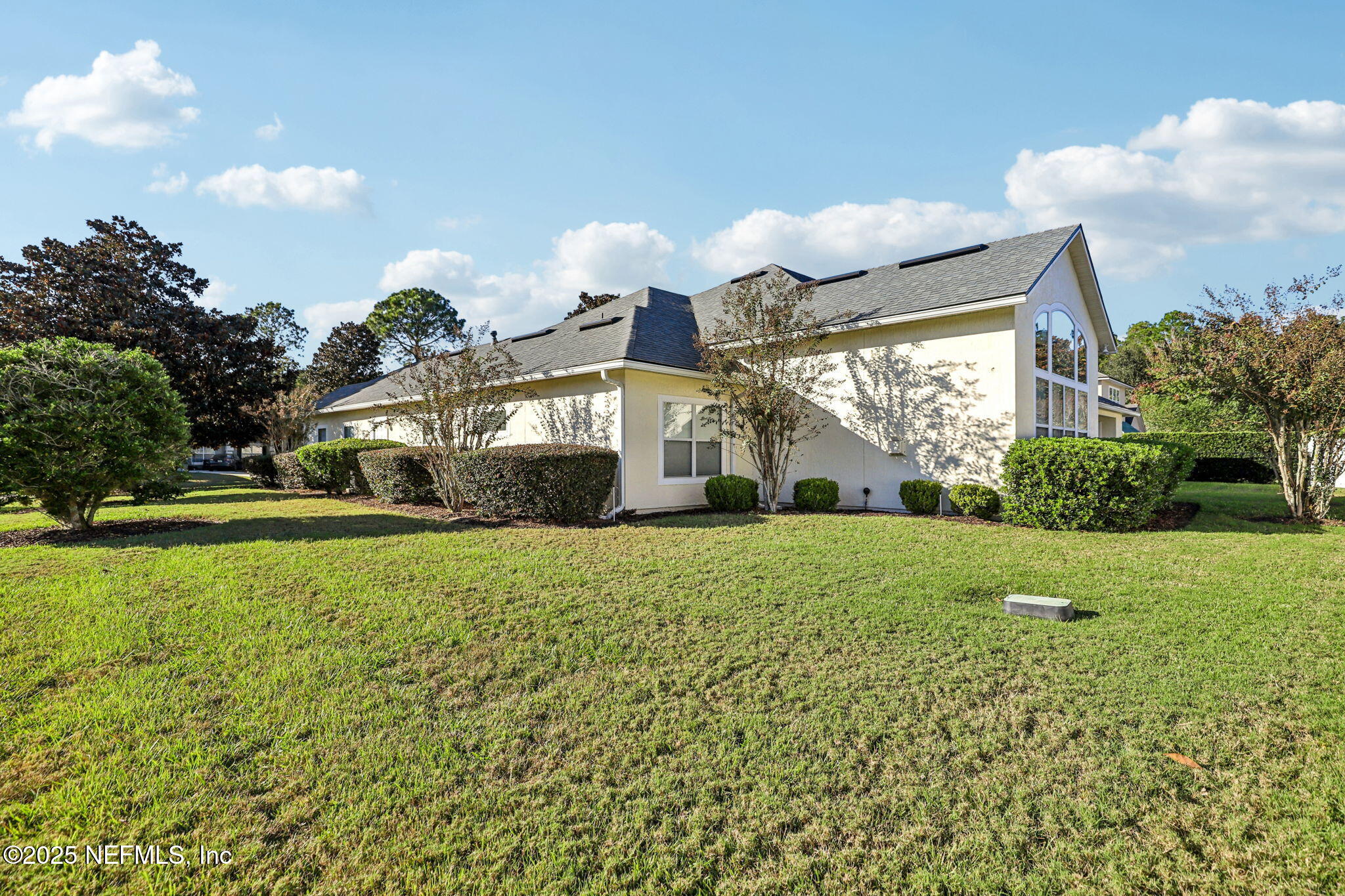 5300 Rising Sun Court St. Johns, FL 32259 - Photo 23 of 43 a front view of a house with garden