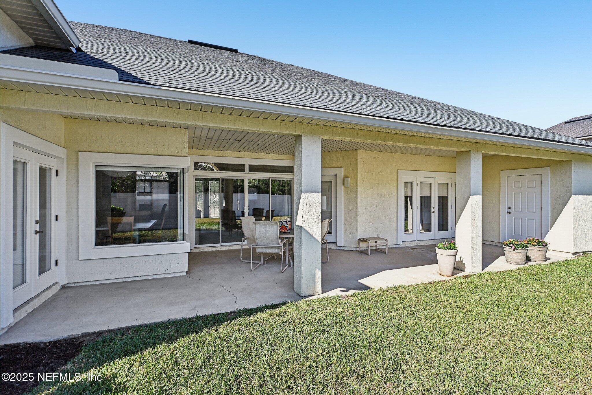 5300 Rising Sun Court St. Johns, FL 32259 - Photo 25 of 43 a front view of a house with garden