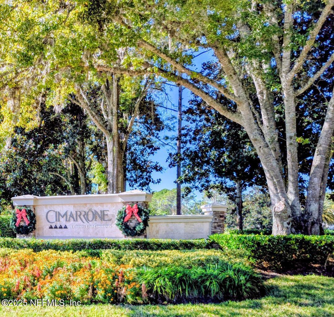 5300 Rising Sun Court St. Johns, FL 32259 - Photo 27 of 43 a sign that is sitting in front of flowers