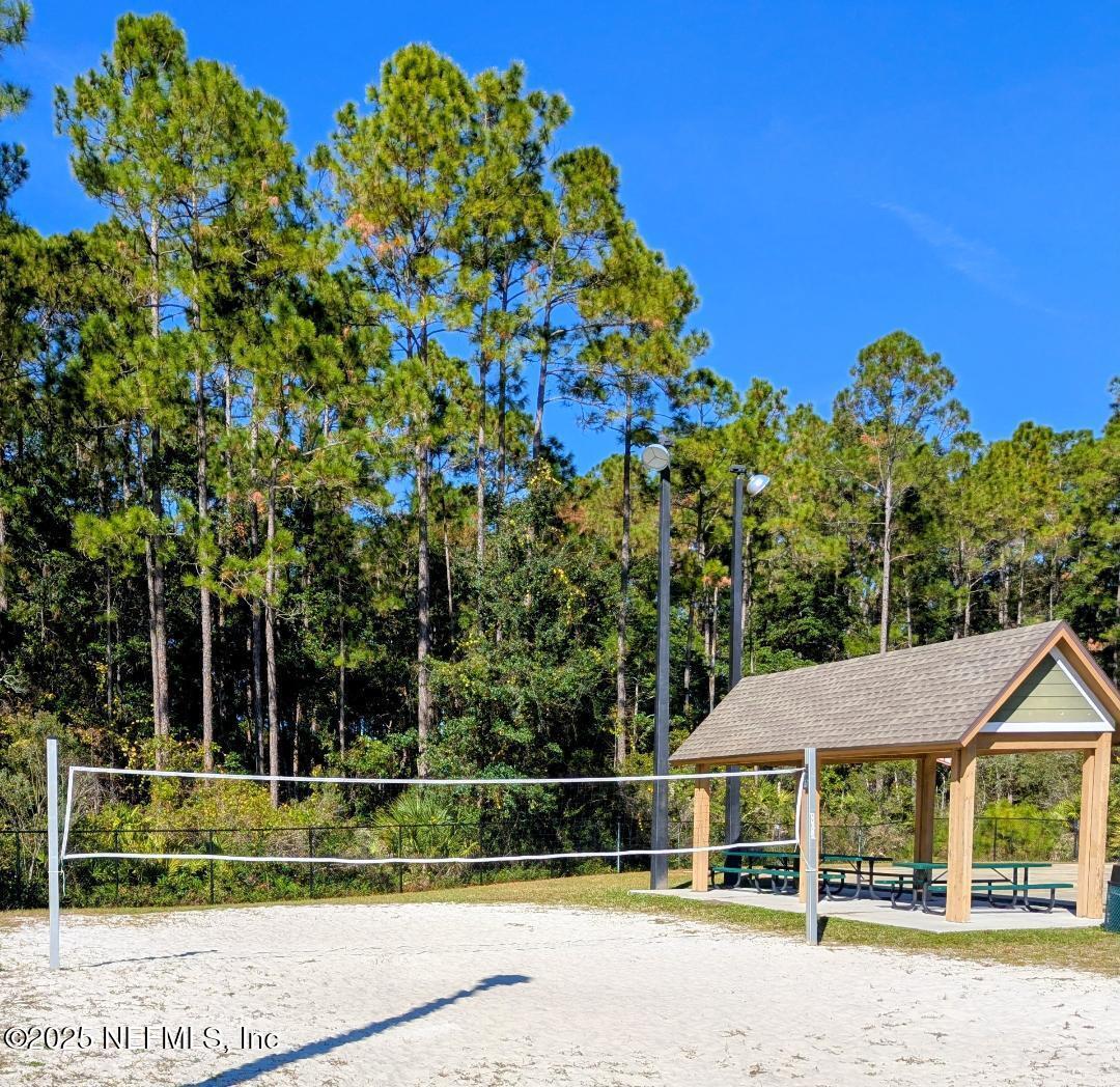 5300 Rising Sun Court St. Johns, FL 32259 - Photo 32 of 43 a front view of a house with a yard