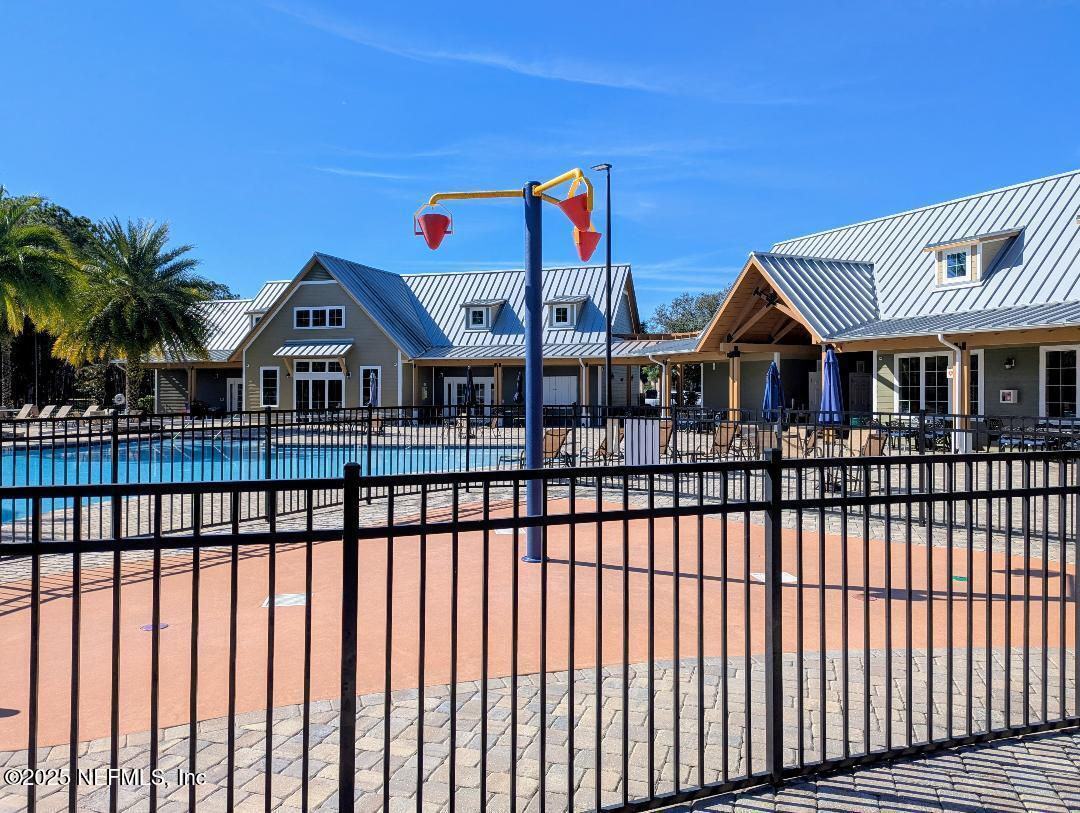 5300 Rising Sun Court St. Johns, FL 32259 - Photo 36 of 43 a front view of a house with a balcony