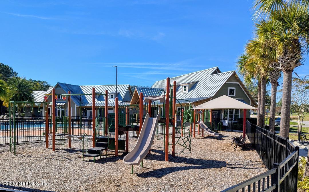 5300 Rising Sun Court St. Johns, FL 32259 - Photo 37 of 43 a front view of a house with a yard