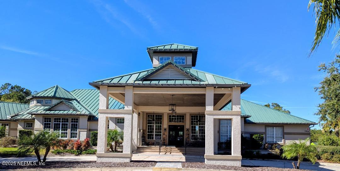 5300 Rising Sun Court St. Johns, FL 32259 - Photo 41 of 43 a front view of a house with garden