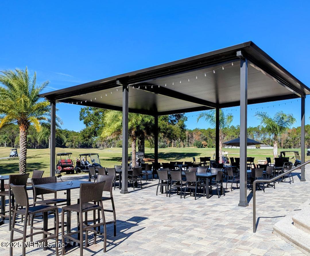 5300 Rising Sun Court St. Johns, FL 32259 - Photo 42 of 43 a view of chairs and table in the patio