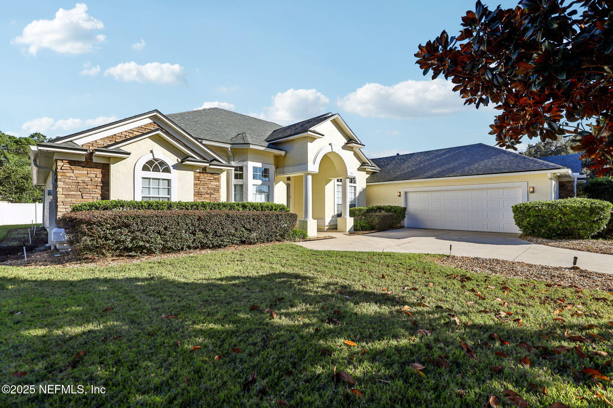 5300 Rising Sun Court St. Johns, FL 32259 - Photo 5 of 43 a front view of a house with a garden