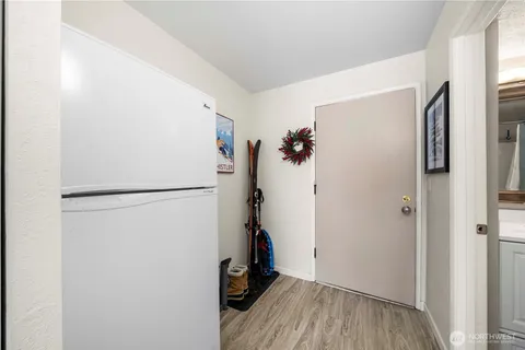 a bathroom with a sink toilet and mirror