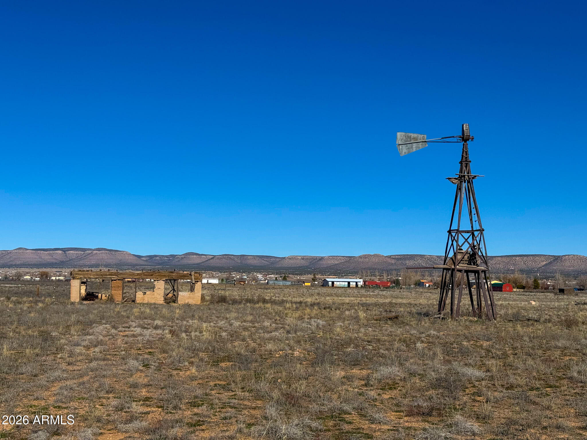 2300 Santa Fe Road Paulden, AZ 86334 - Photo 13 of 21 a view of a large building with a mountain in the background