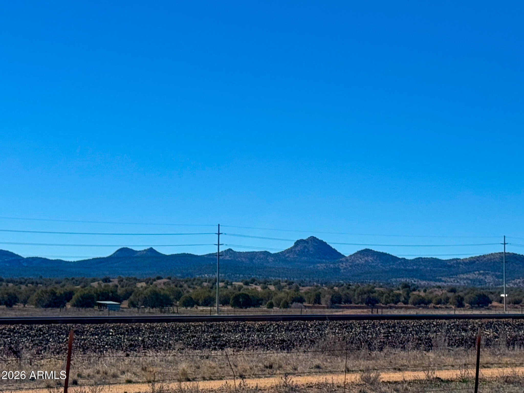 2300 Santa Fe Road Paulden, AZ 86334 - Photo 17 of 21 a view of a town with mountains in the background