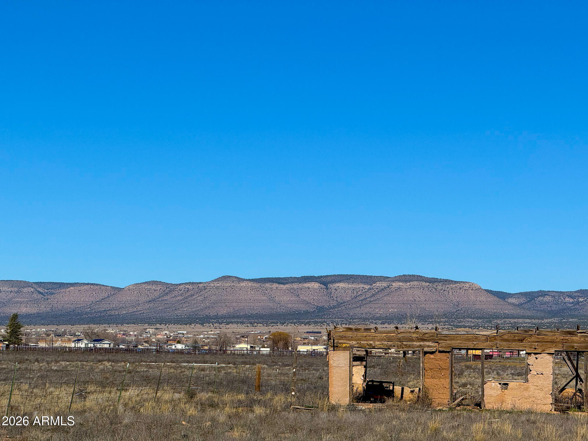 2300 Santa Fe Road Paulden, AZ 86334 - Photo 19 of 21 a view of a town with mountains in the background