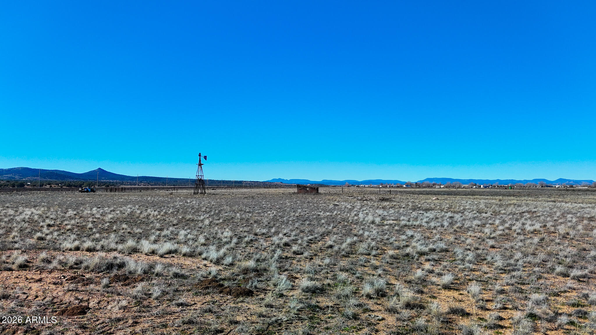2300 Santa Fe Road Paulden, AZ 86334 - Photo 8 of 21 a view of an ocean beach and a yard