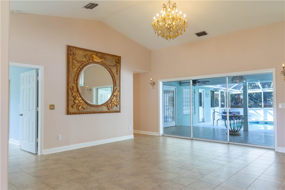 122 Coconut Street Sebastian, FL 32958 - Photo 14 of 36 a view of livingroom with chandelier