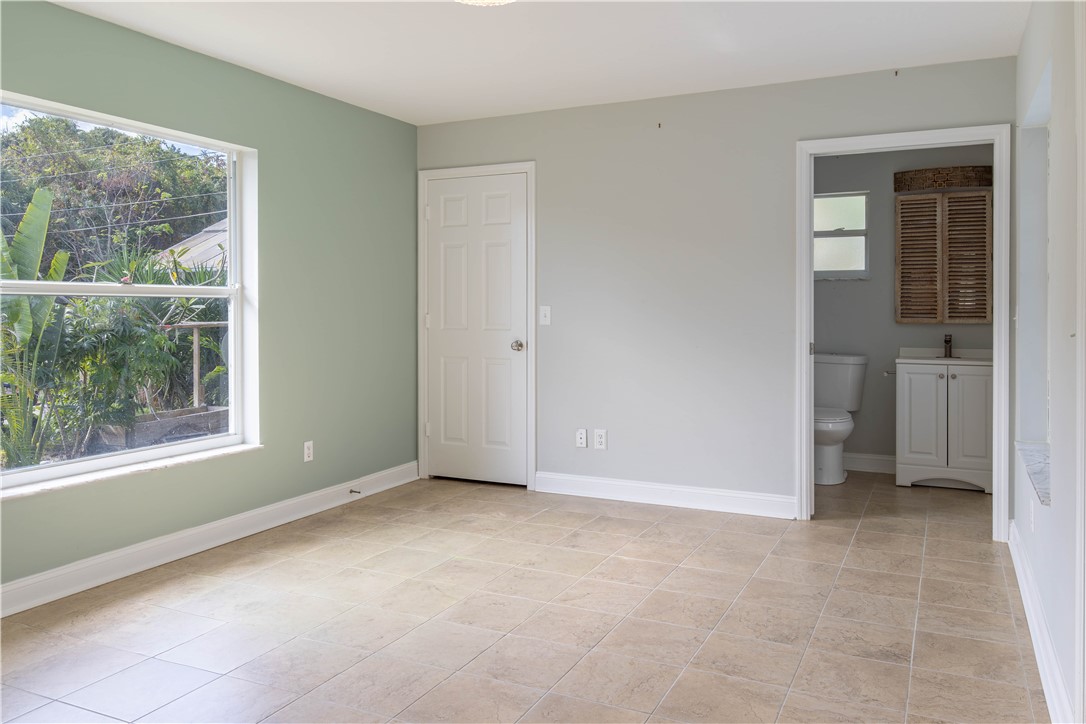 122 Coconut Street Sebastian, FL 32958 - Photo 24 of 36 a view of an empty room with a window