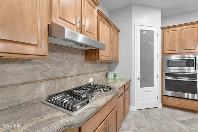 a view of a living room and dining room